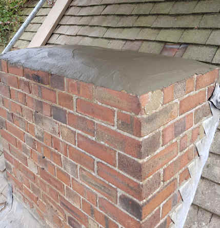 Chimney reduced to minimum height and pots removed Chimney reduced to minimum height and pots removed