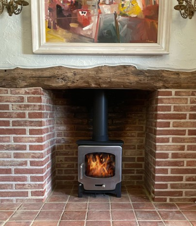Saltfire ST-X4 with burnished door log burner Saltfire ST-X4 with burnished door log burner